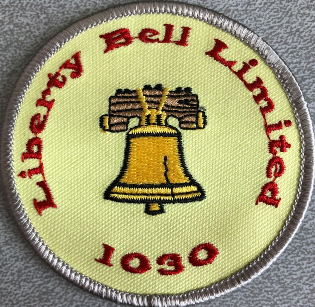 patch with trolley on it, yellow background